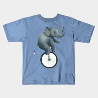 An elephant rides a unicycle Kids T-Shirt